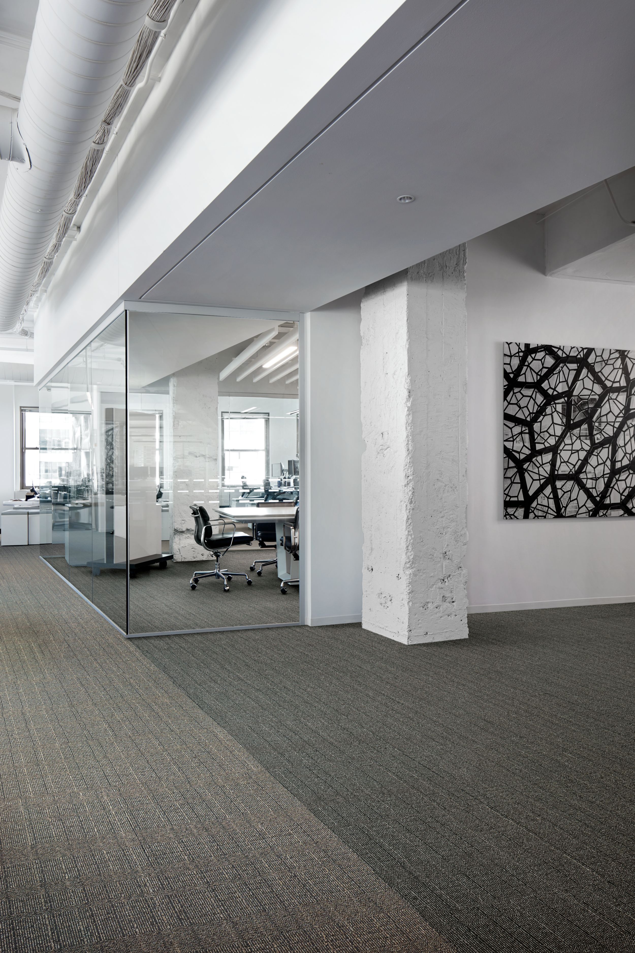 Interface Old Street carpet tile with rough white concrete colum and glass corner office image number 6